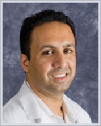 Dr. Adil Mohamed Roomi MD
