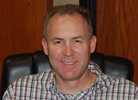 Dr. Brian Ernest Drew DDS