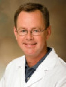 Dr. James  Holland  M.D.