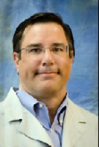 Dr. Trevor  Lewis MD